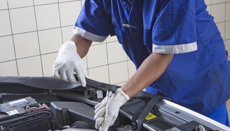 Mechanic fixing car