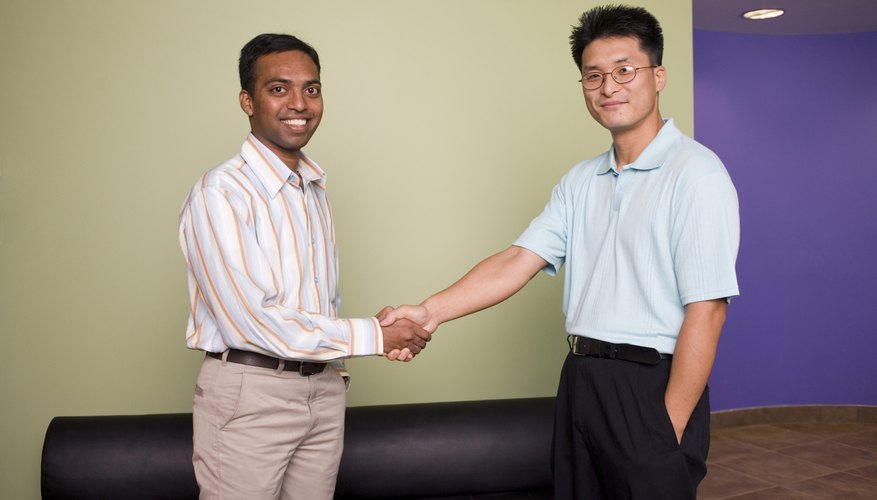 Two businessmen shaking hands