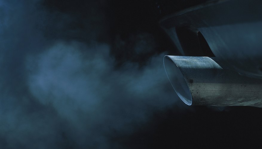 a exhaust pipe of a car emitting fumes