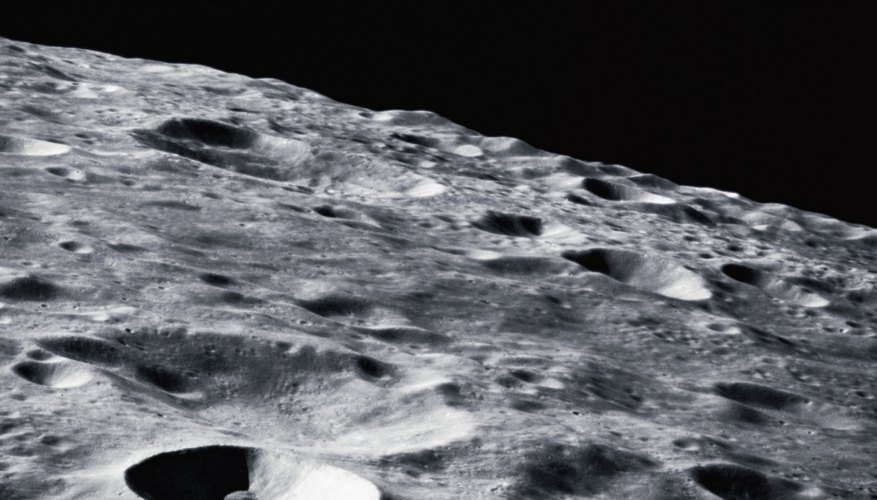Photo Credit: Stockbyte/Stockbyte/Getty Images The moon's surface can be disturbed by solar wind storms.