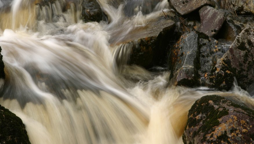 Photo Credit: Hemera Technologies/AbleStock.com/Getty Images The Suwannee River faces a number of pollution threats.