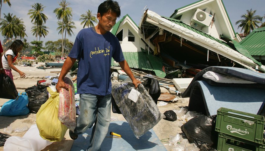 The tsunami that struck Thailand in 2004 was caused by an earthquake beneath a nearby oceanic trench. The tsunami that struck Thailand in 2004 was caused by an earthquake beneath a nearby oceanic trench.