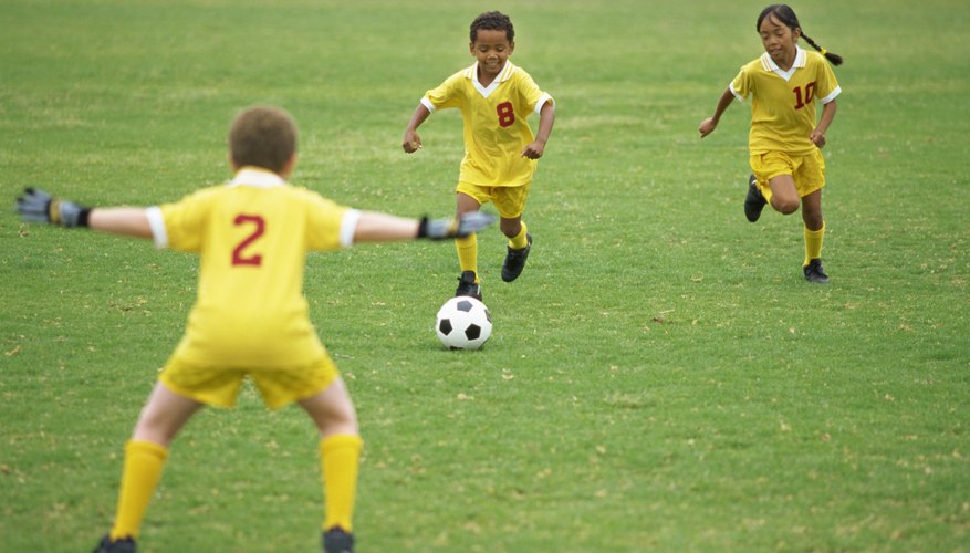 Kids playing soccer Kids playing soccer