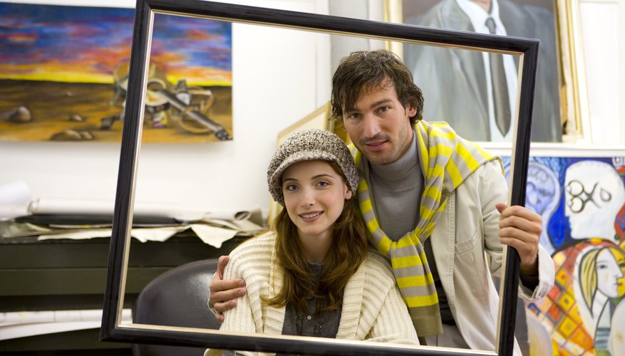 Photo Credit: Goodshoot/Goodshoot/Getty Images Frame the contributed photos, and place them on the wall.