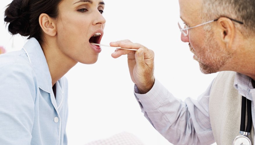 Doctor checking patient Doctor checking patient