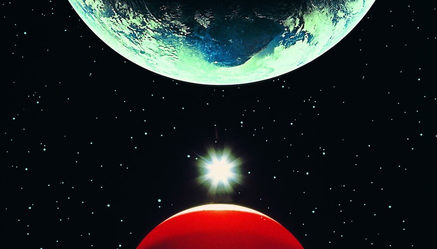 Photo Credit: Digital Vision./Photodisc/Getty Images The rotational periods of Earth and Mars are almost the same.