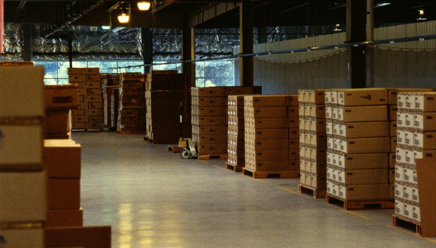 Photo Credit: Ryan McVay/Photodisc/Getty Images Stacked boxes in a warehouse.