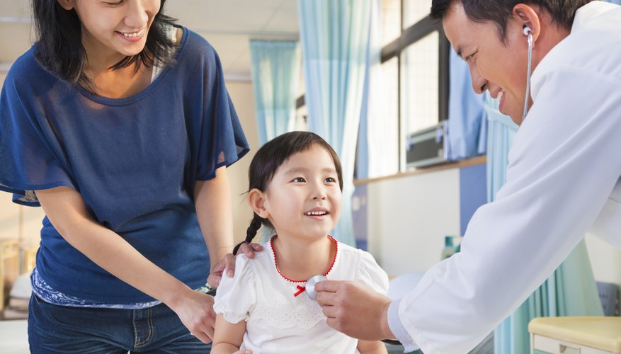 Mother and daughter in doctor's office