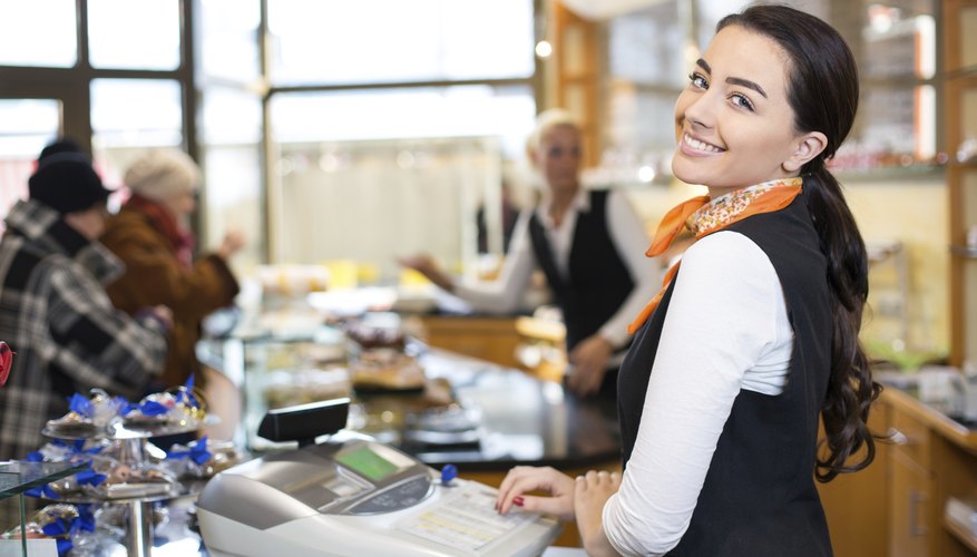 Salesperson at cash register
