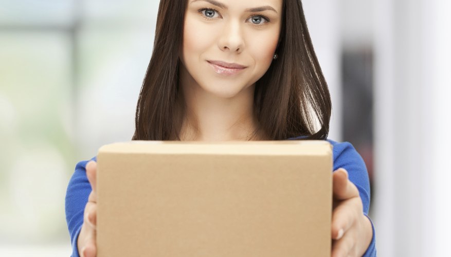businesswoman delivering box
