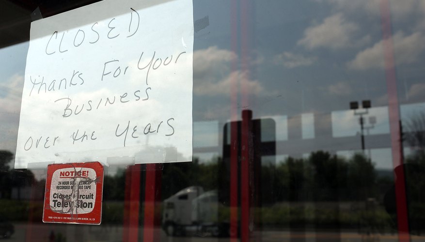 Photo Credit: Spencer Platt/Getty Images News/Getty Images Sign on window of closed video store in New York