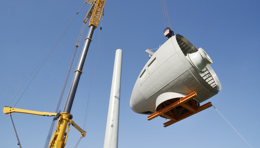 Mobile crane picking up gear equipment for wind turbine