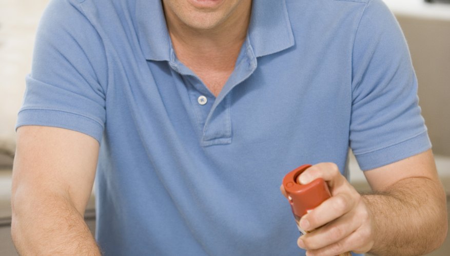 Rub furniture polish over the sticker until it is saturated. Rub furniture polish over the sticker until it is saturated.