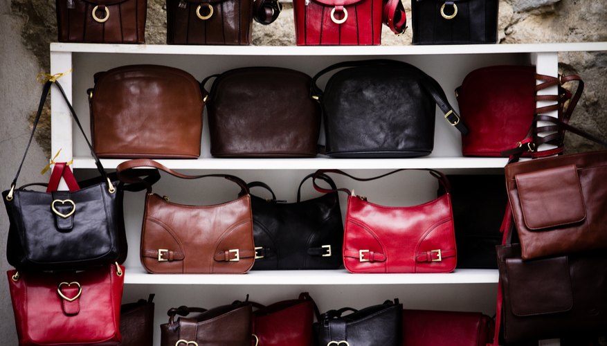 Purses on shelves indoors