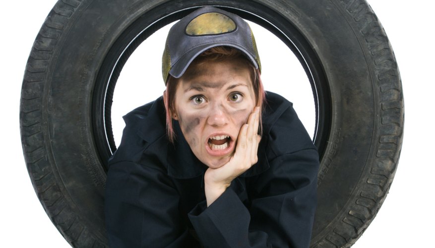 Angry mechanic inside tire