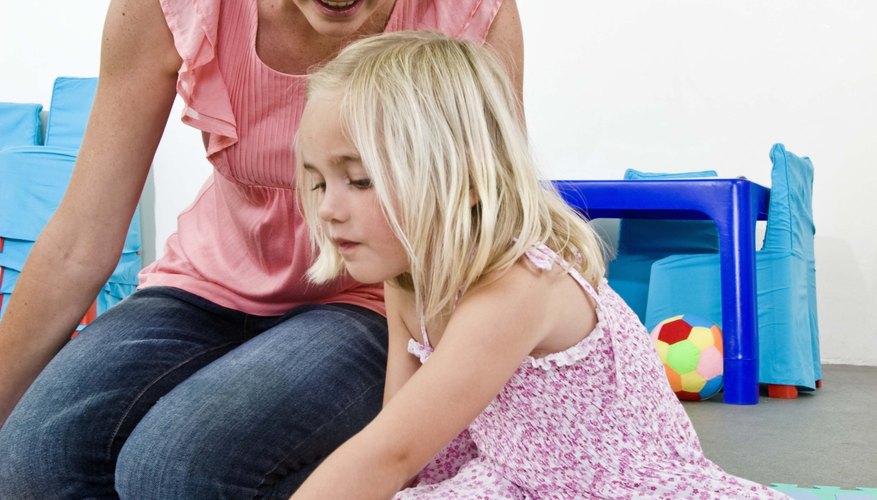 Photo Credit: Jupiterimages/Goodshoot/Getty Images Preschool learning includes matching the correct number to the quantity of objects.