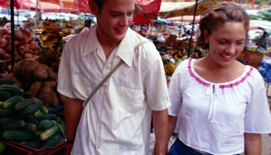 Photo Credit: Steve Mason/Photodisc/Getty Images A couple shops at an organic produce stand.