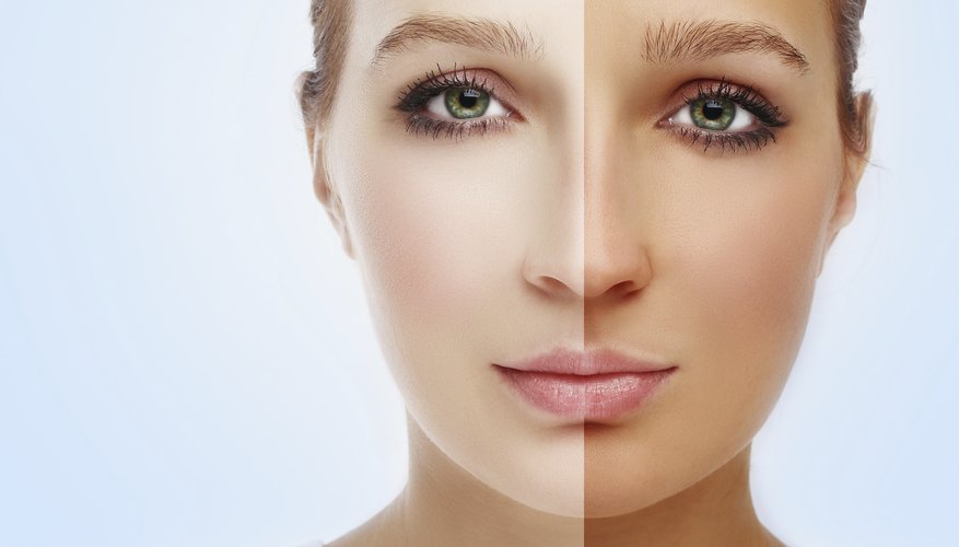 Model's face divided in two parts - tanned and natural.