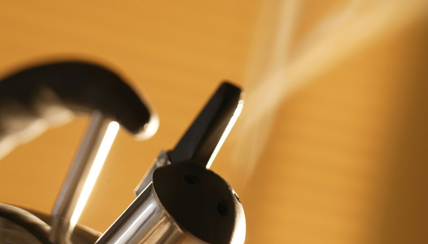 Photo Credit: Comstock/Stockbyte/Getty Images Water can boil at room temperature if the atmospheric pressure is low enough.