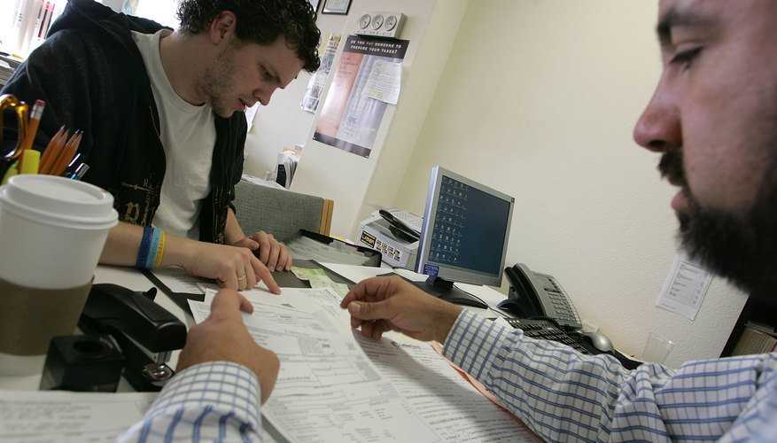 You may hire a tax professional to help you figure and file your taxes.