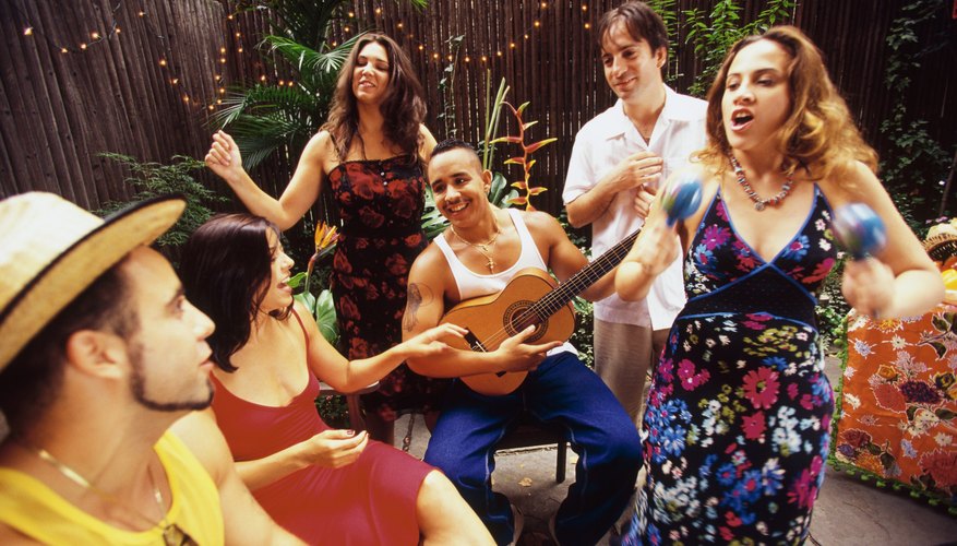 Woman playing maracas in party band