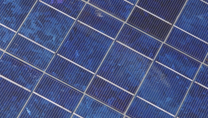 Photo Credit: Jupiterimages/Photos.com/Getty Images closeup of solar panels