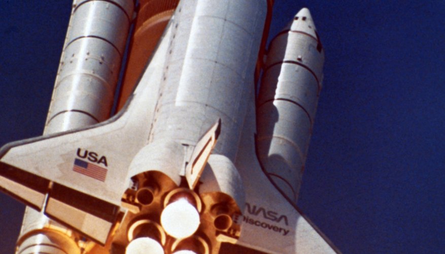 Aerospace engineers design spacecraft like the space shuttle.