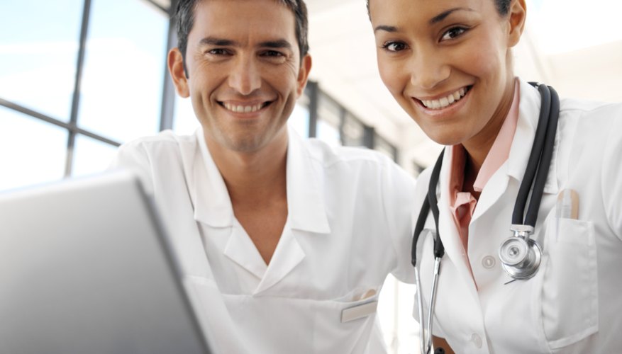 Photo Credit: George Doyle/Stockbyte/Getty Images Medical professionals on a computer
