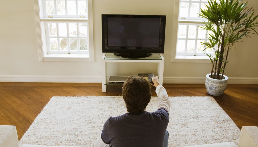 Man watching tv Man watching tv