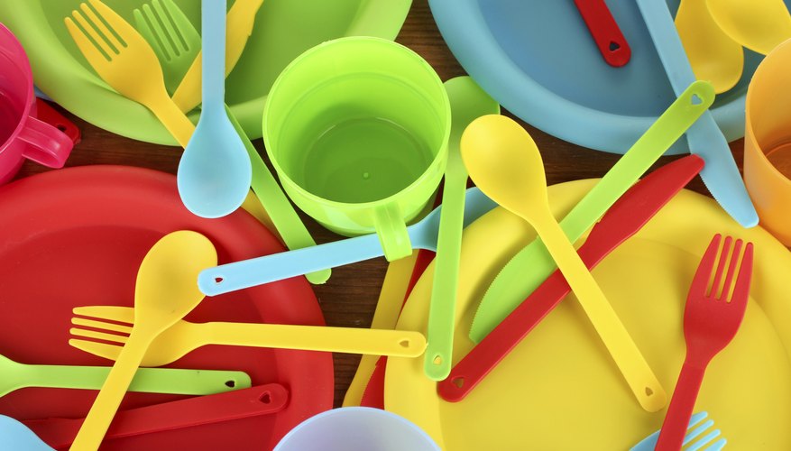Photo Credit: serezniy/iStock/Getty Images Plastic cups, plates and utensils.