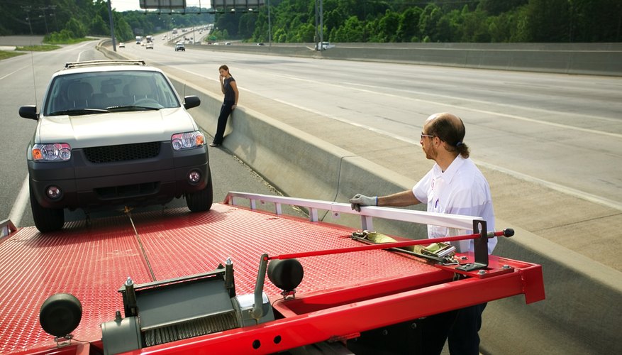 Photo Credit: Thinkstock/Stockbyte/Getty Images Drivers working for companies receive benefits that self-employed drivers do not.