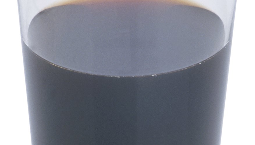 Photo Credit: Hemera Technologies/PhotoObjects.net/Getty Images Glass containers work best for science projects dissolving nails in soda.