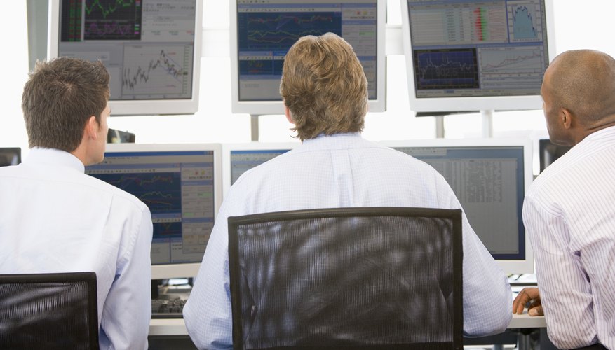 Stock Traders Viewing Monitors