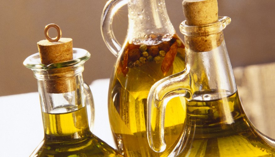 Oil saturates and softens the glue. Oil saturates and softens the glue.