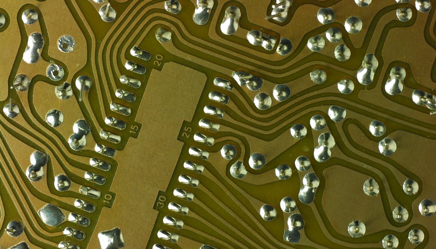 Photo Credit: Photos.com/Photos.com/Getty Images A multimeter cannot test current on a PCB.