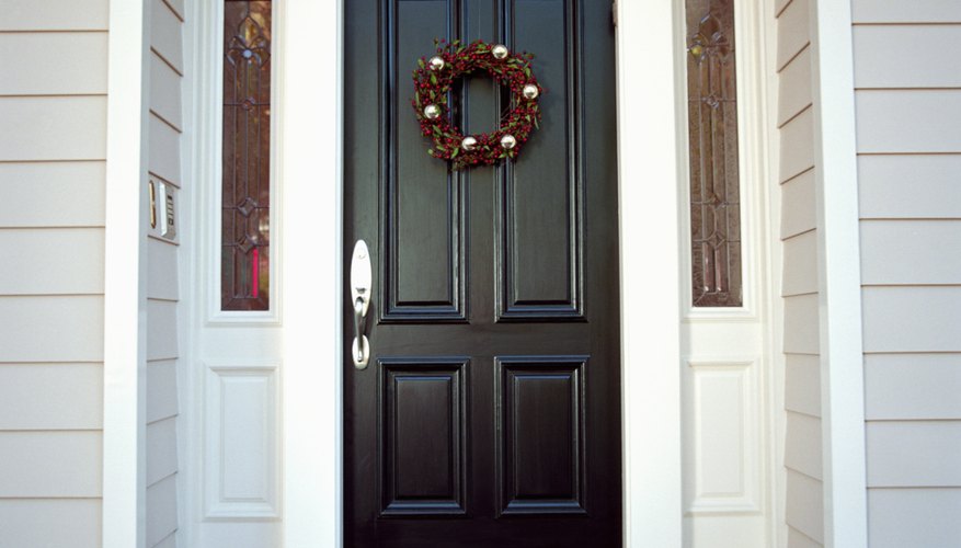 Christmas wreath on front door of house