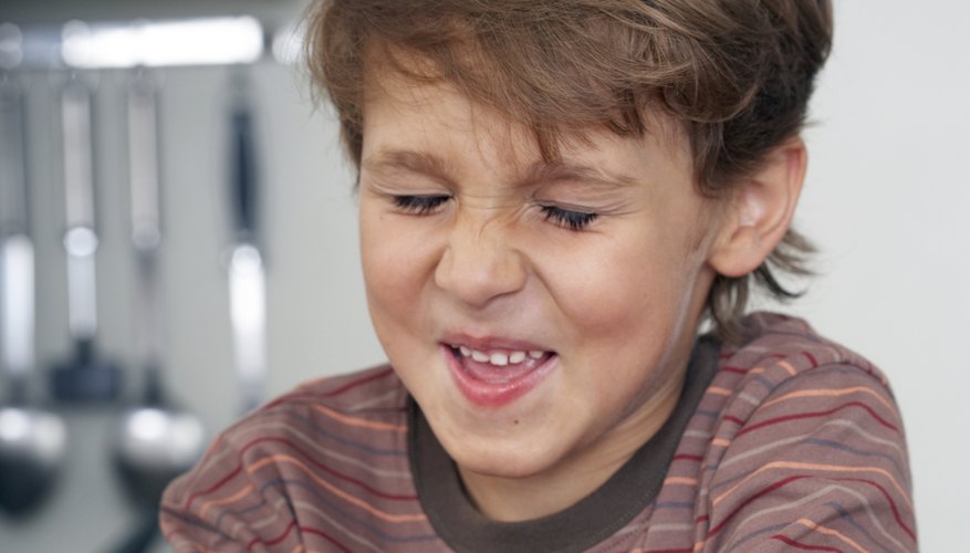Your child might make a face to act out 'disgusting.' Your child might make a face to act out 'disgusting.'