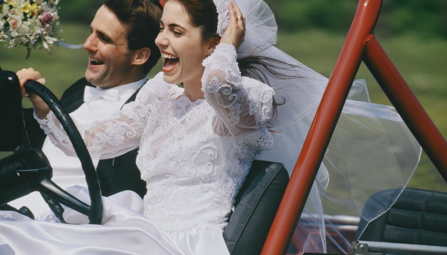 Bride driving off-road vehicle