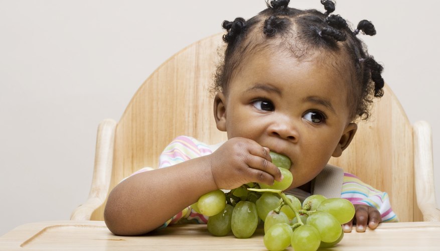 When feeding him solid foods for the first time, it is best to begin by introducing one type of fruit or vegetable over a period of several days. When feeding him solid foods for the first time, it is best to begin by introducing one type of fruit or vegetable over a period of several days.