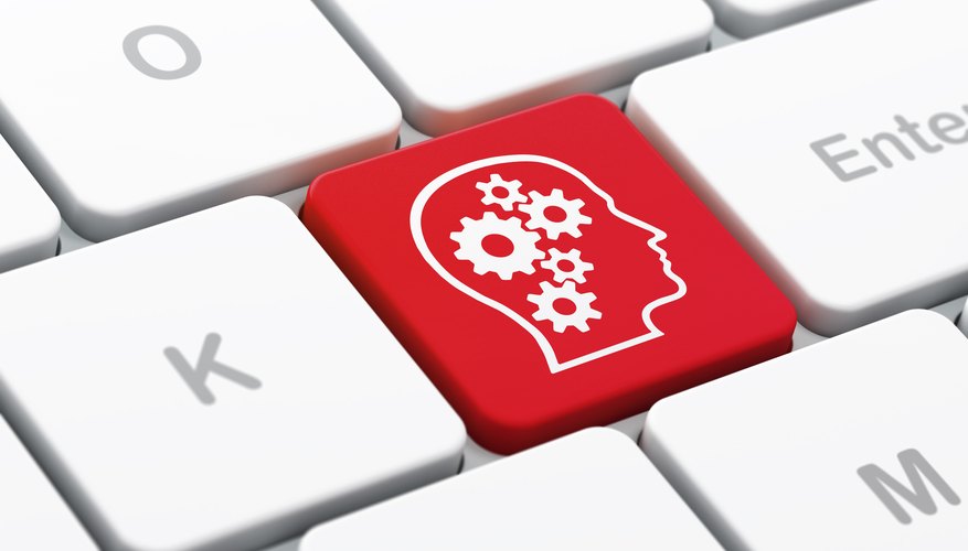 Advertising concept: Head With Gears on computer keyboard background