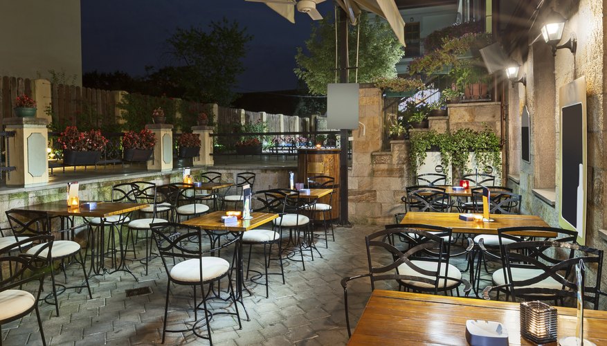 Photo Credit: dejankrsmanovic/iStock/Getty Images Relaxed Southern restaurant with wooden tables and New Orleans-inspired chairs.