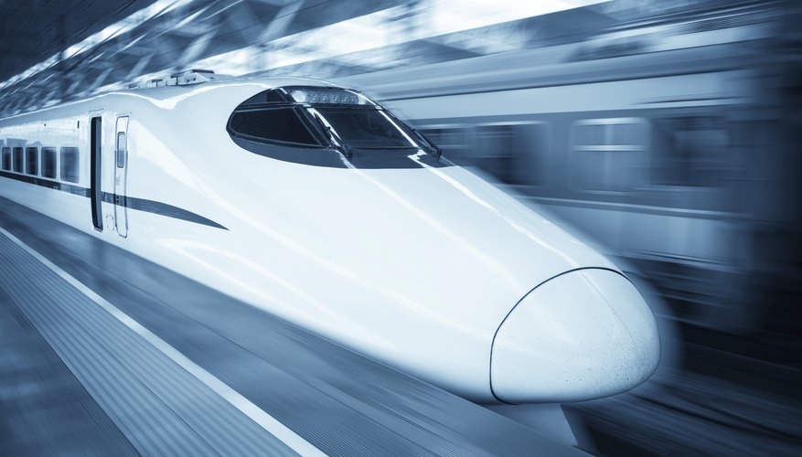 Photo Credit: chuyu/iStock/Getty Images High speed train passing through station