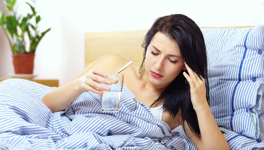 sick woman drinking water sick woman drinking water