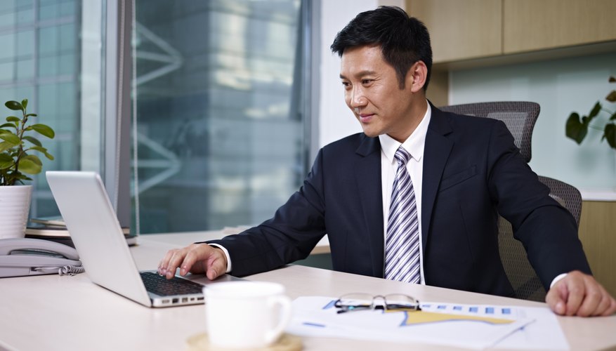 Photo Credit: imtmphoto/iStock/Getty Images man staying productive at work