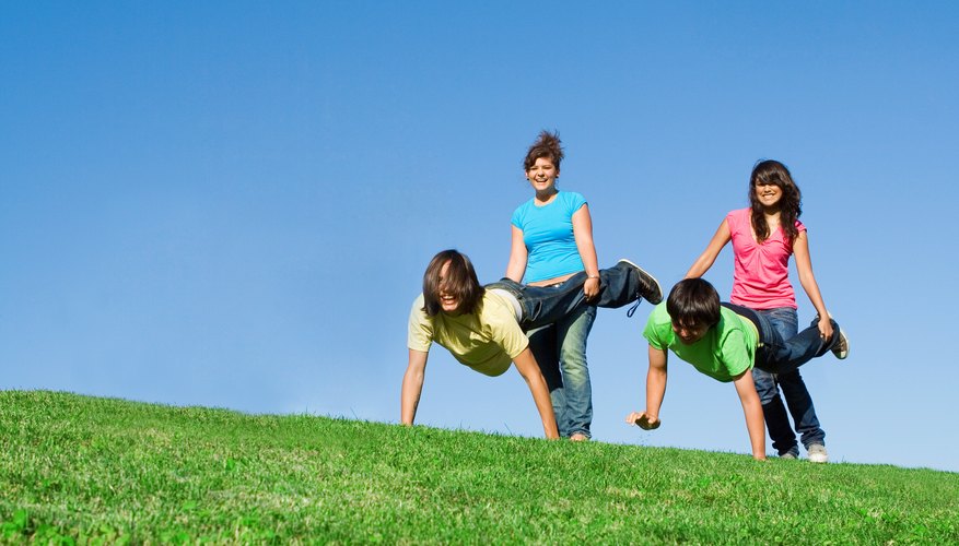 Photo Credit: mandygodbehear/iStock/Getty Images Competitors in a wheelbarrow race