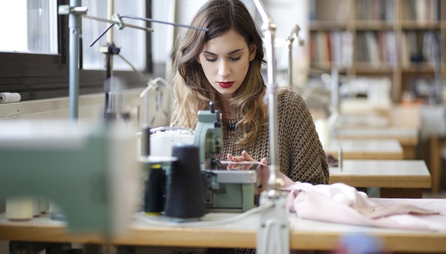 Tailor sewing in workshop
