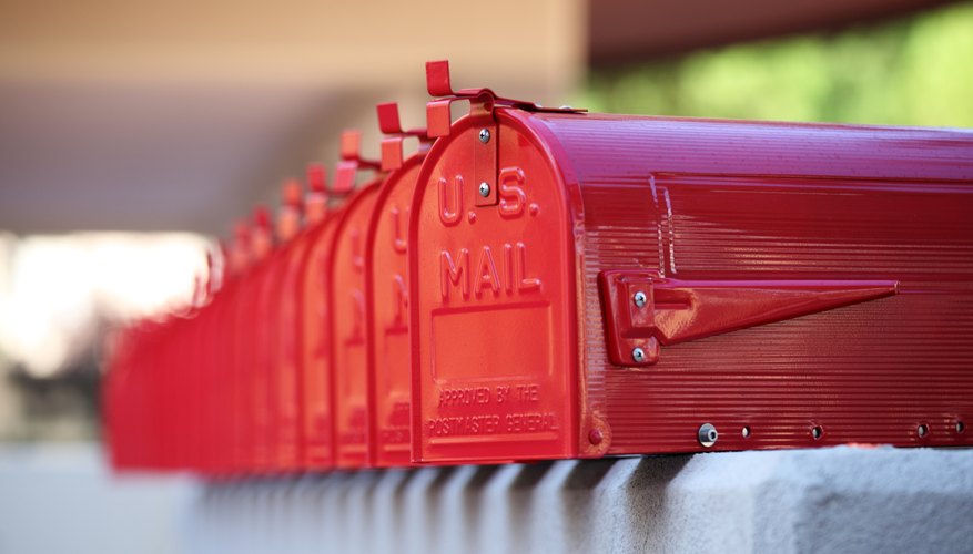us glossy red mailbox repetition and blurred background
