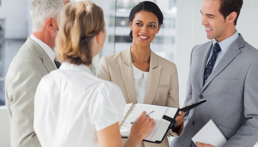 Cheerful business people making an appointment