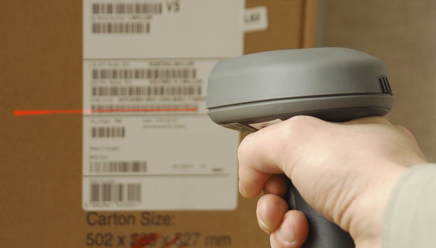Barcode scaner in hands for a man