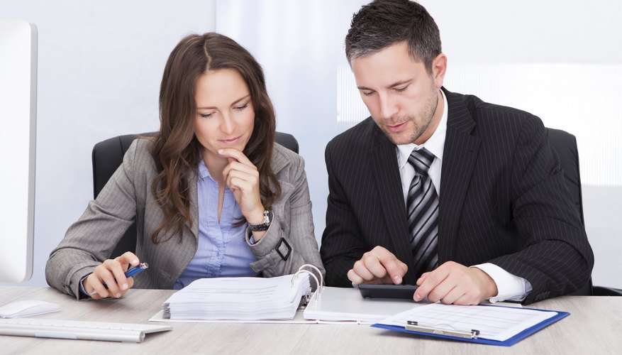 Two businesspeople are having a discussion.